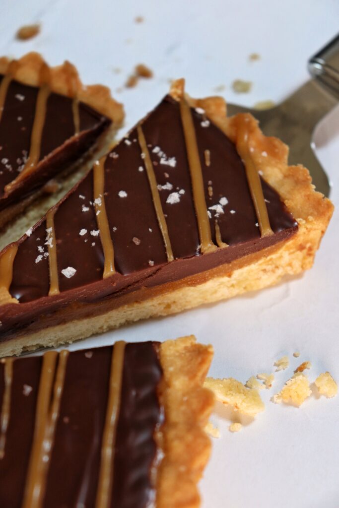 Slice of millionaire's salted caramel tart