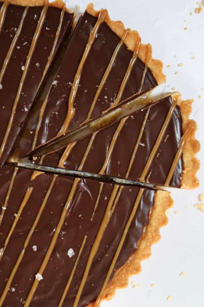 Millionaire's salted caramel tart cut into slices
