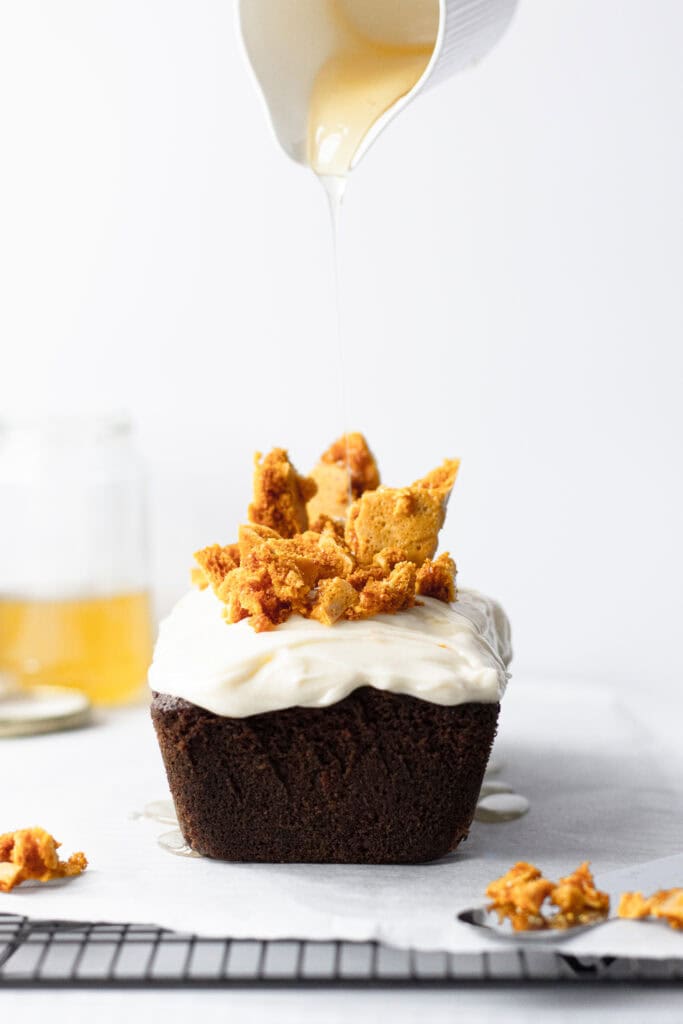 Drizzling honey on loaf cake