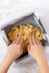 Pressing out chocolate orange cookie dough