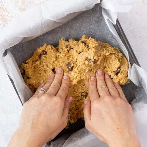 Pressing out chocolate orange cookie dough