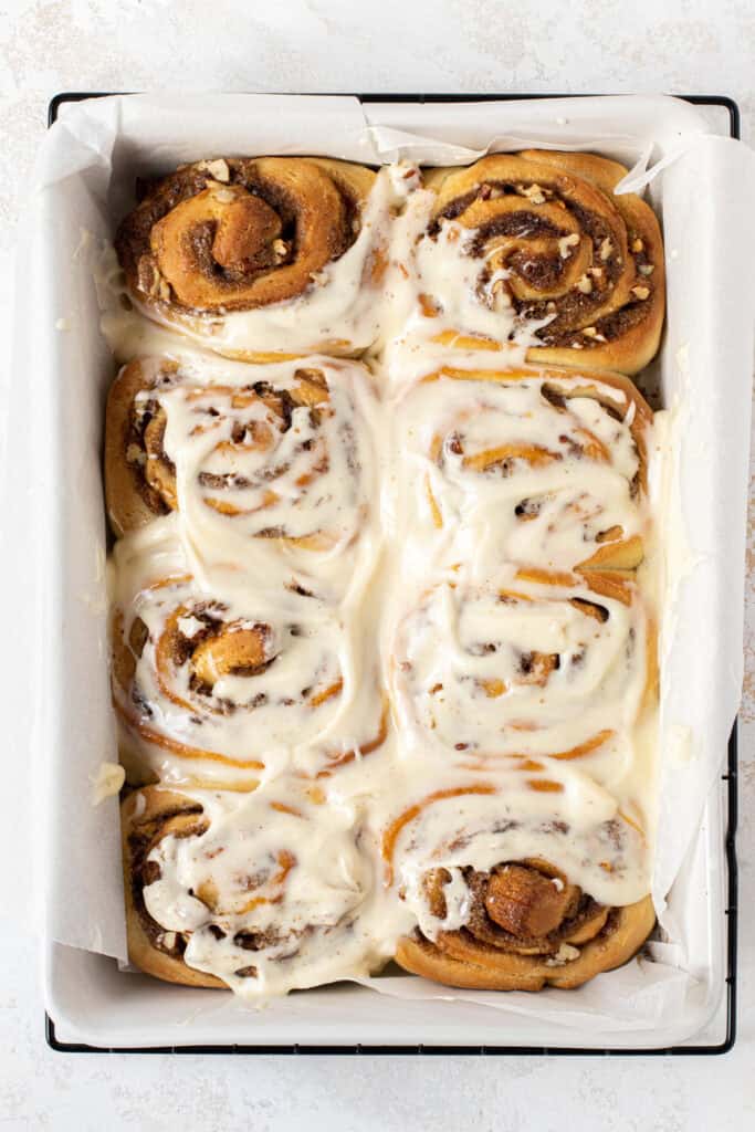 Pecan Cinnamon Rolls with Maple Cream Cheese Frosting