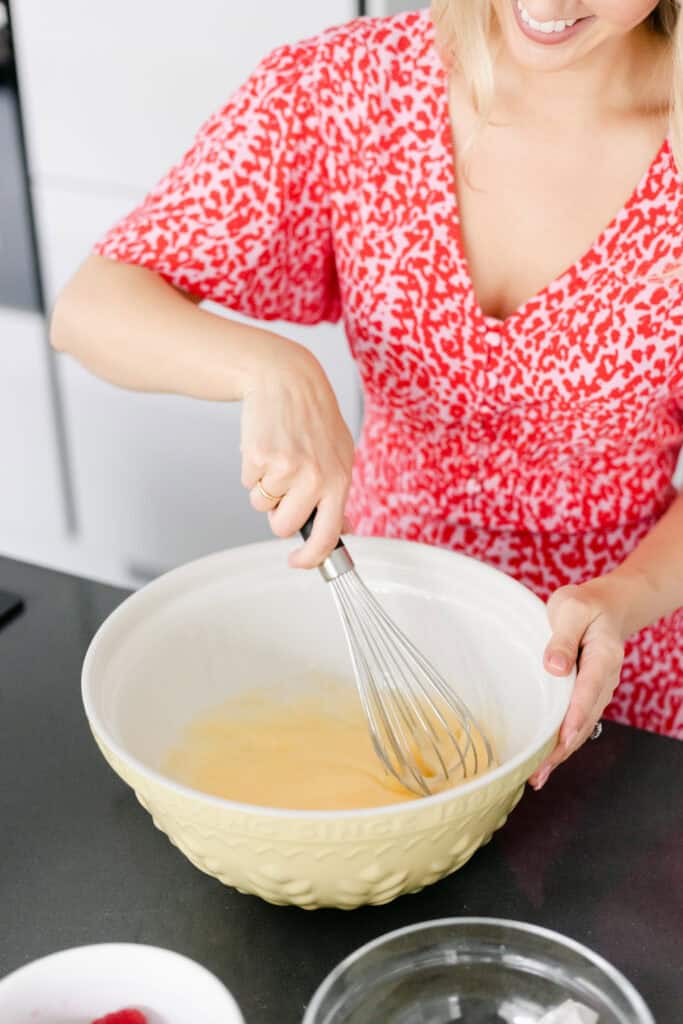 whisking sugar and eggs