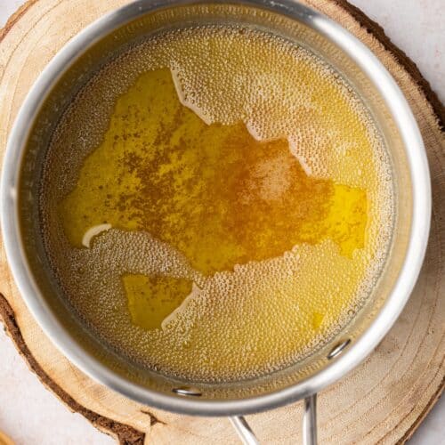A top down view of some brown butter in a pan