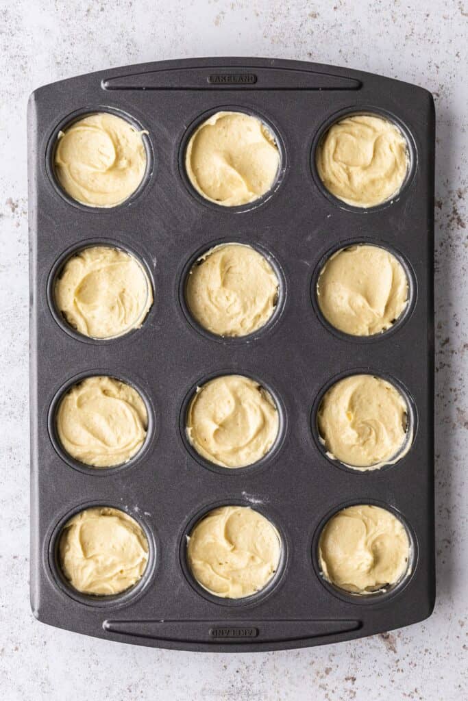 Mini cake tin with sponge mixture