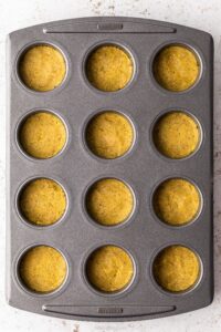 A top down view of some pistachio biscuit cheesecake bases