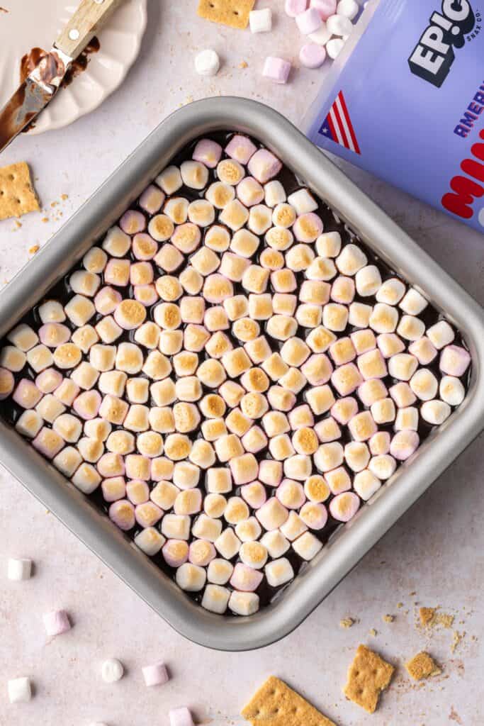 s'mores cheesecake bars in a baking tin
