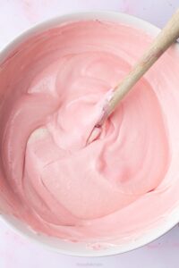 a bowl of raspberry mousse