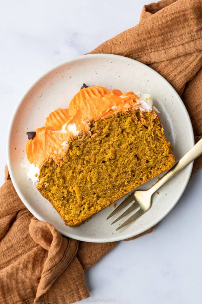a slice of pumpkin spice loaf cake
