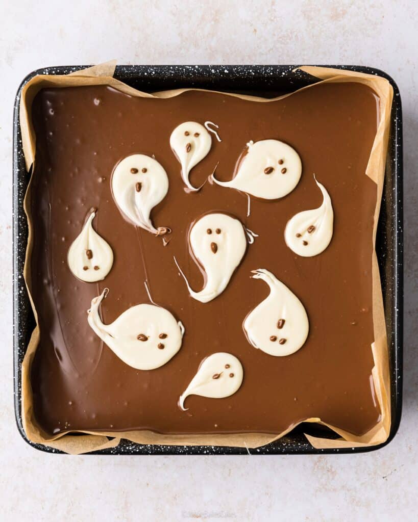 white chocolate ghosts on millionaires shortbread