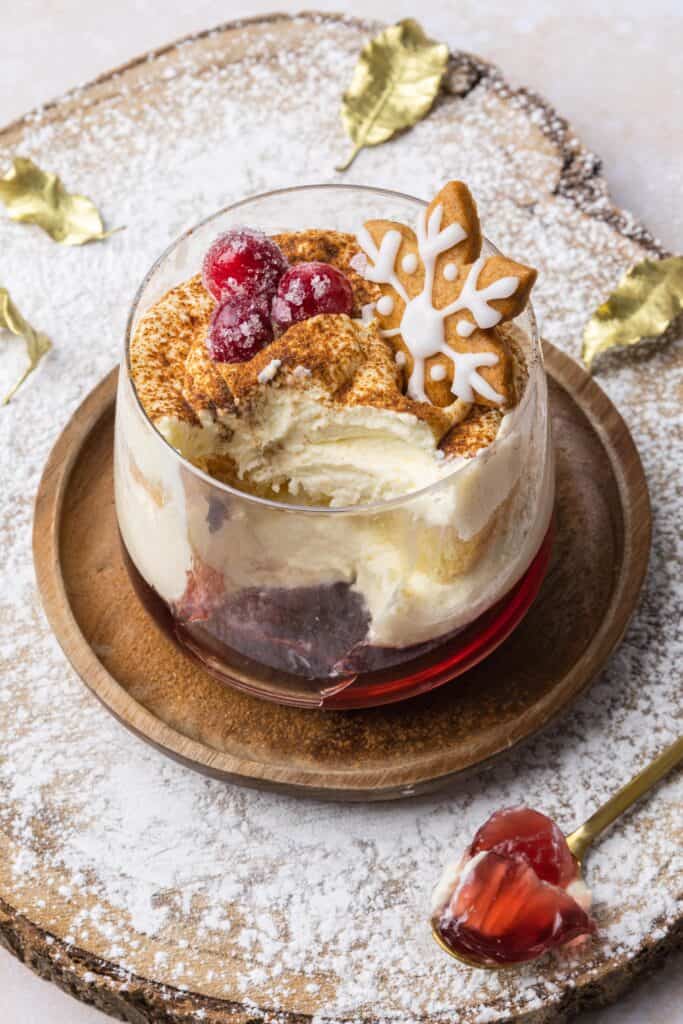 a spoon digging into a Mulled Wine Christmas Trifle