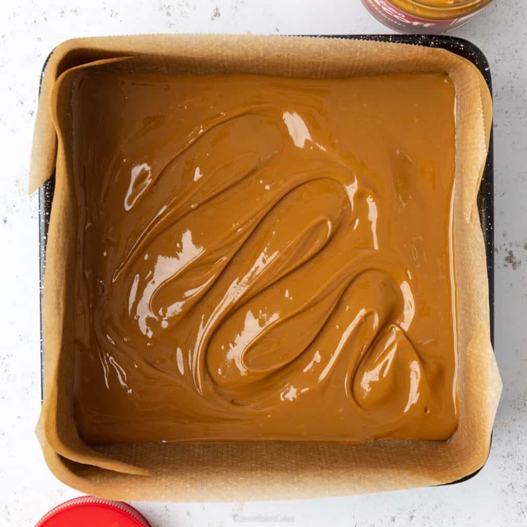 biscoff spread layered in baking tin