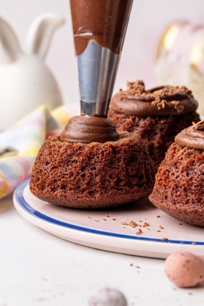 filling chocolate cake with chocolate buttercream
