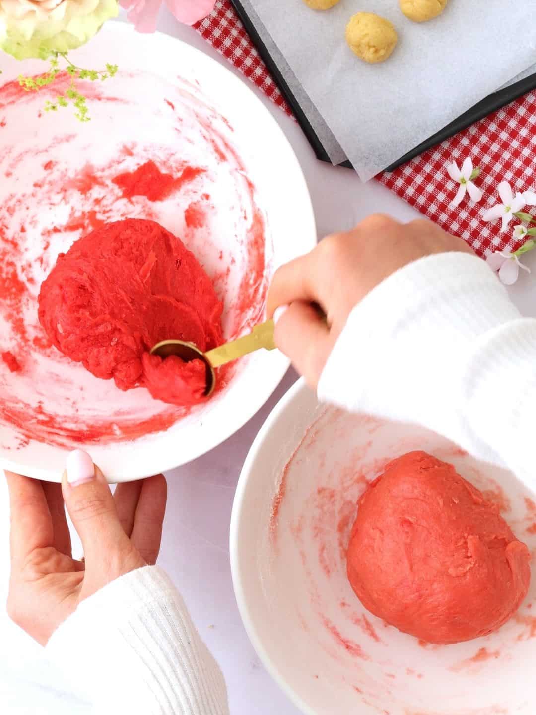 scooping up the pink cookie dough