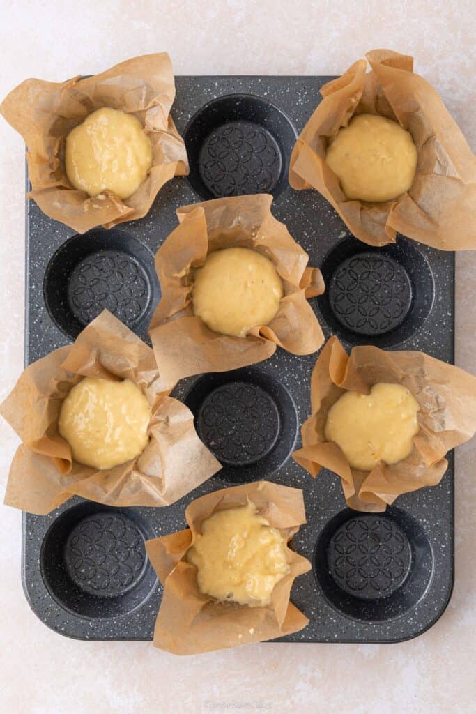 How To Stop Blueberries From Sinking in Muffins - layer of muffin mixture