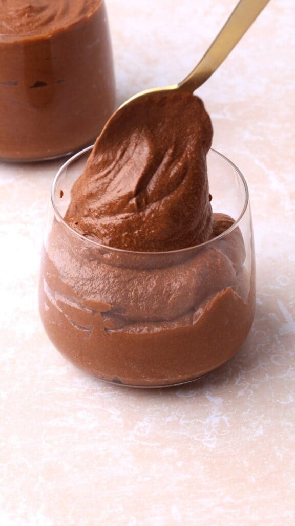 spooning in chocolate mousse