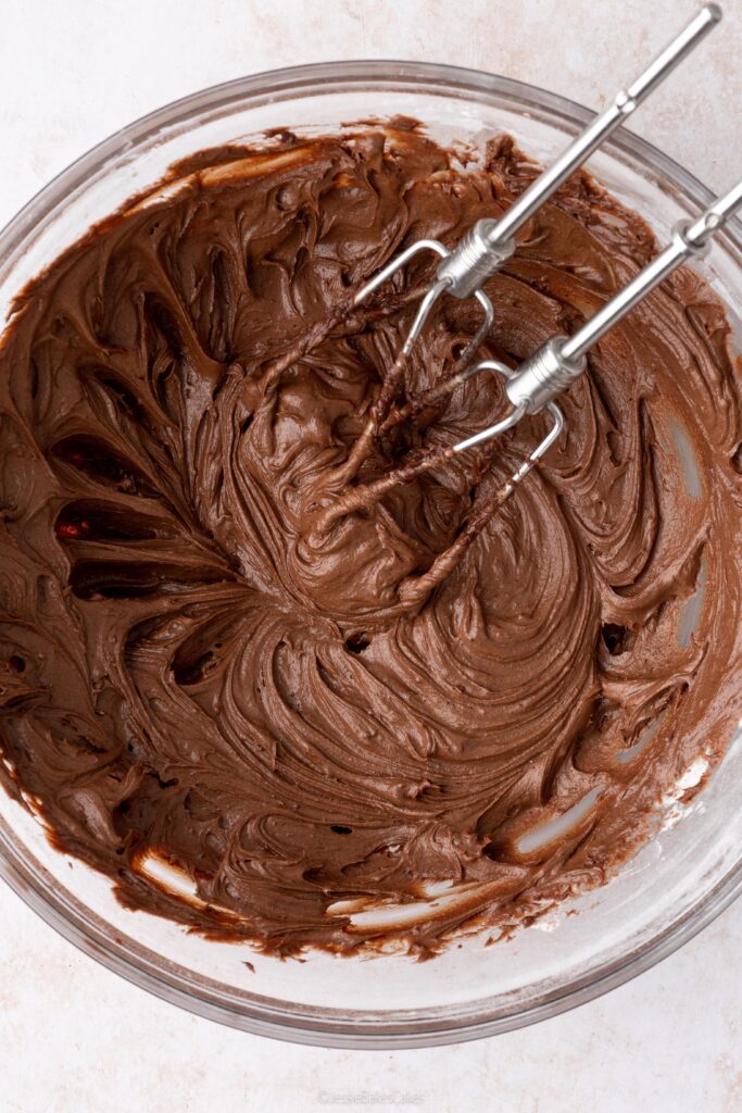 a bowl filled with chocolate buttercream